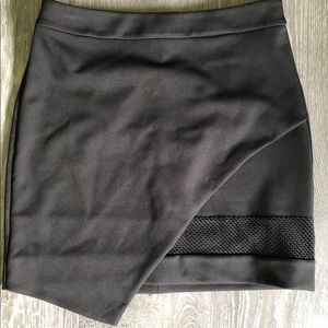Express asymmetrical mini skirt with mesh inset